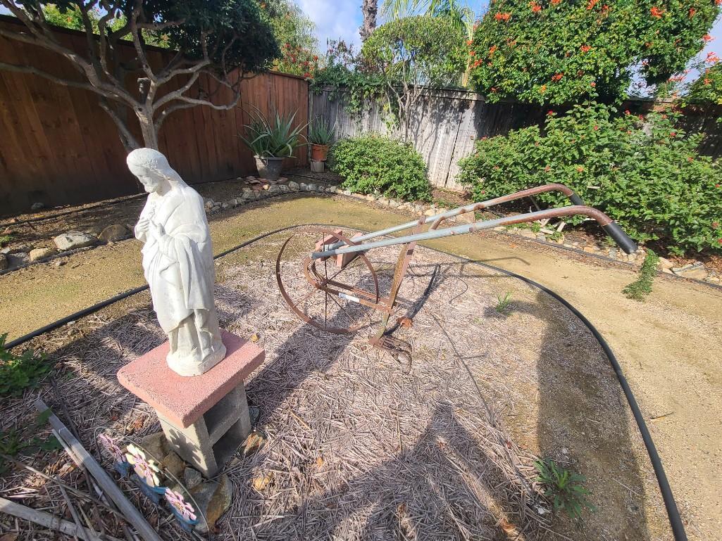 Front Yard - Religious Statue Jesus Yard Art Antique Tiller, Benches, etc.