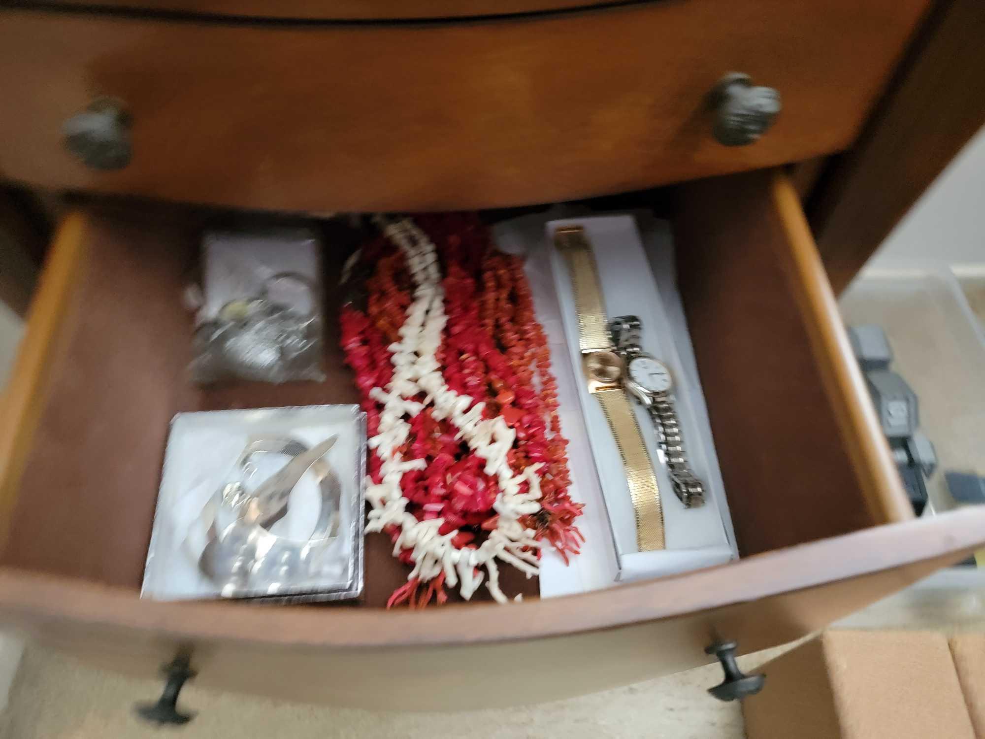 jewelry case full of jewelry, silver coins, omega watch nice