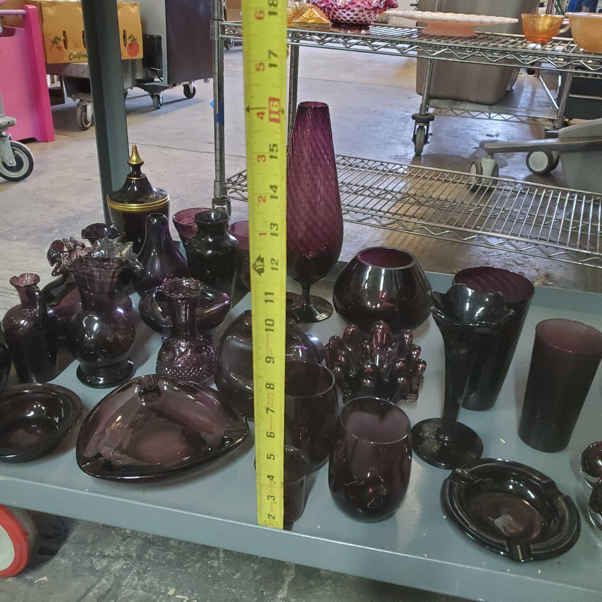 Lot of vintage purple glass vases ashtrays Goodwill Location