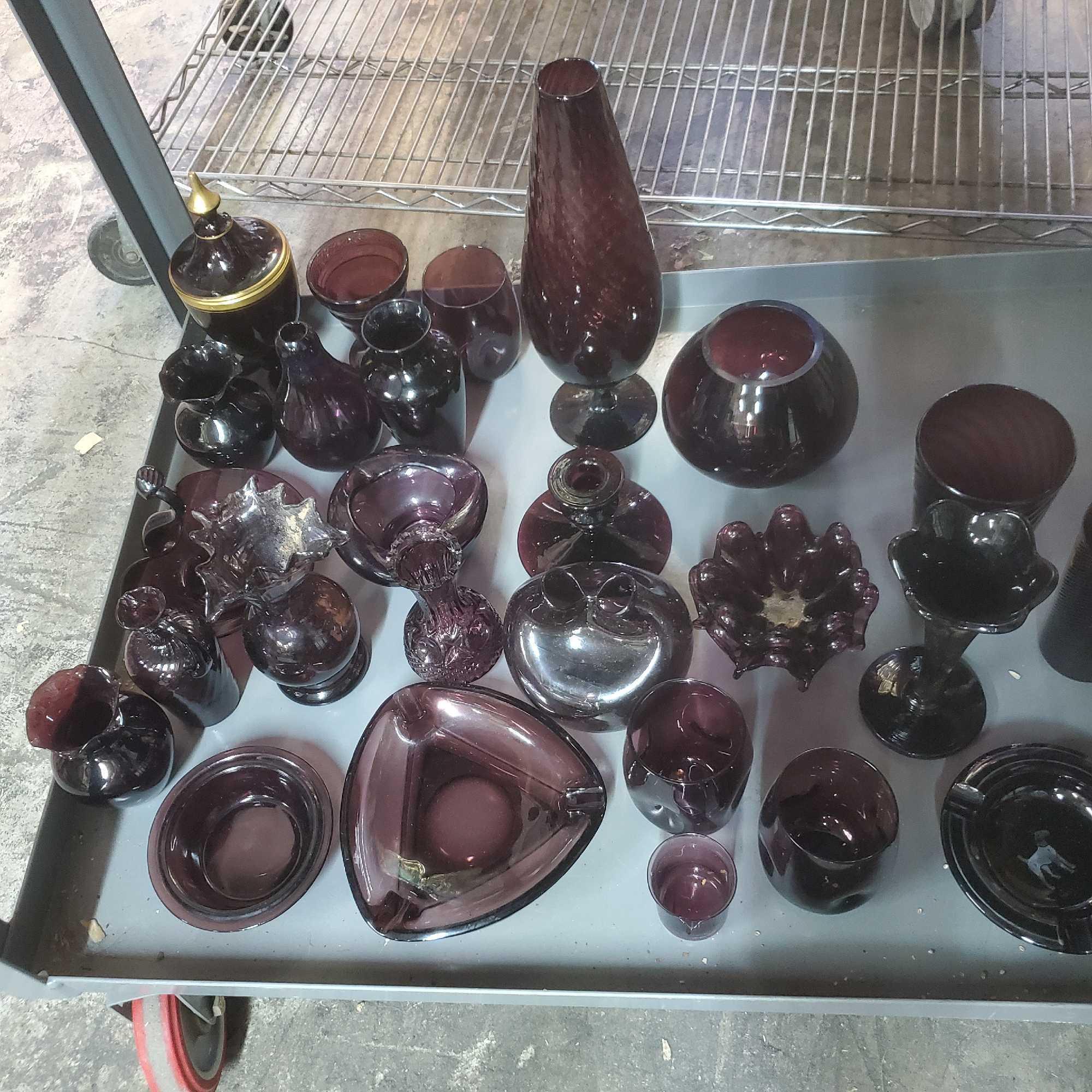 Lot of vintage purple glass vases ashtrays Goodwill Location