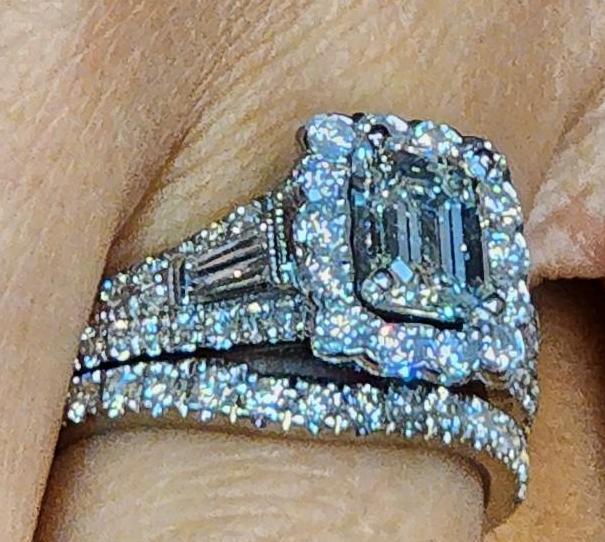 1ct center stone Emerald Cut VVS2 2kt+ total diamond total weight and band white gold neil lane GIA