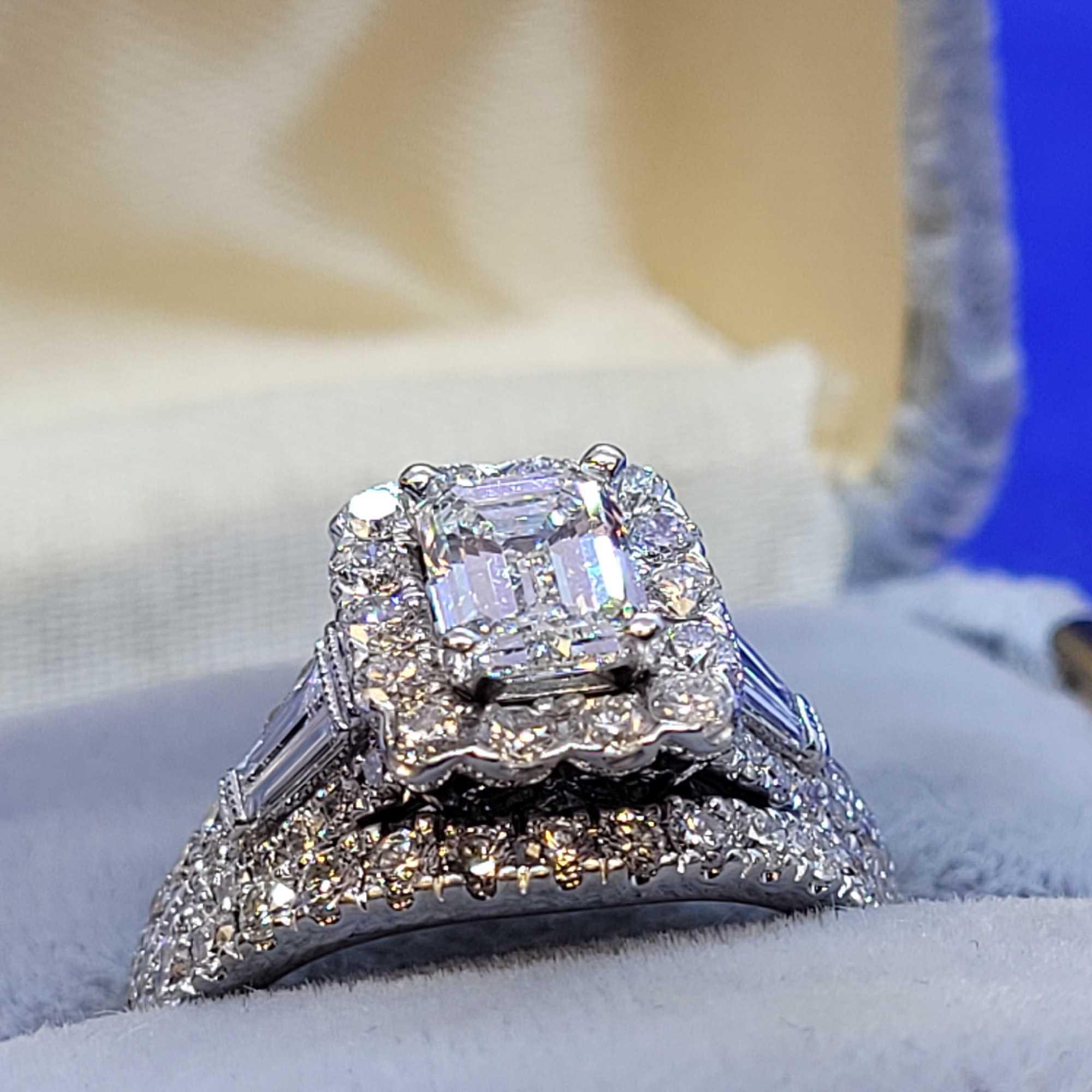 1ct center stone Emerald Cut VVS2 2kt+ total diamond total weight and band white gold neil lane GIA