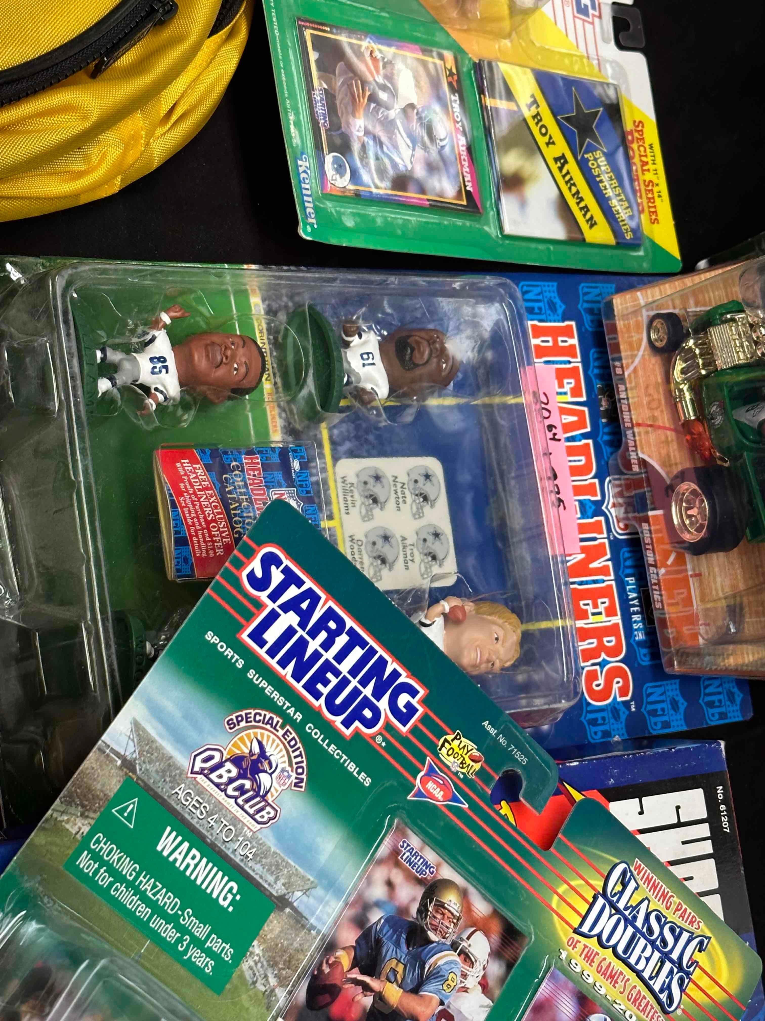 Large Lot of Sports Collectibles. SLUs, Hot Wheels, Books, Photo plaques more