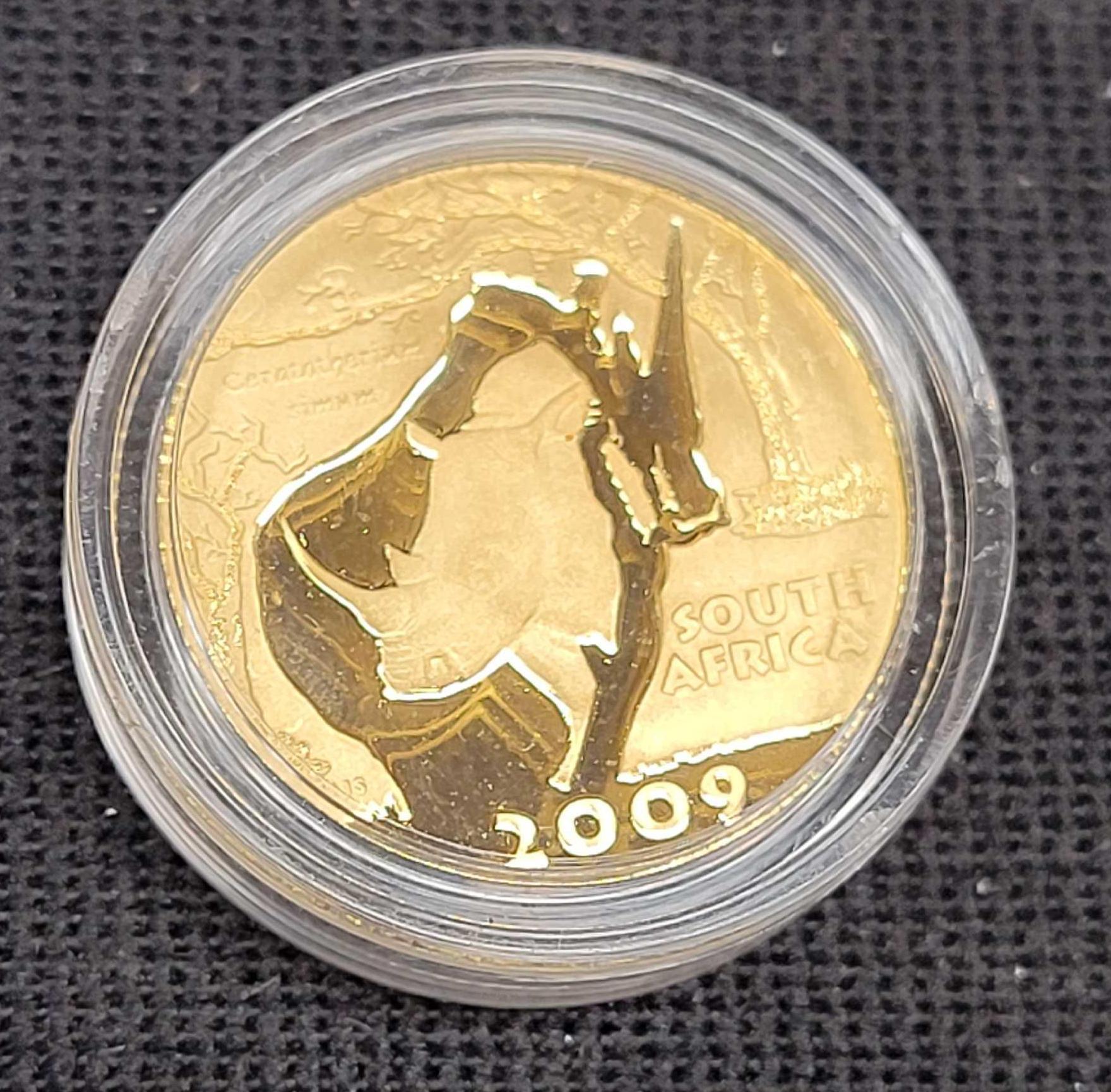 Special Edition Natura Series 24kt gold coins and Silver Rhino sculpture