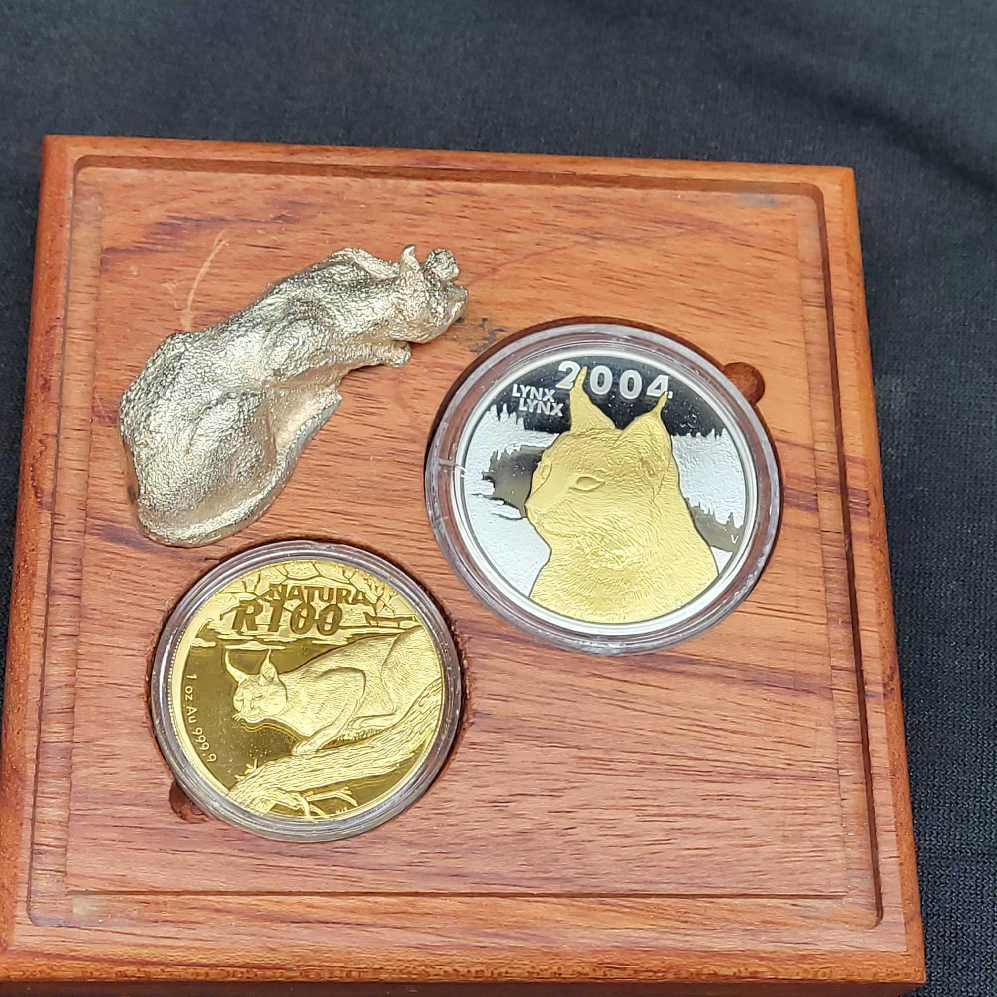 2004 Natura Launch set 24kt gold coin with silver coin and silver Lynx