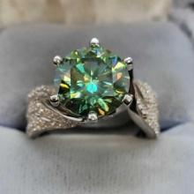 silver ring with set green blue Moissanite diamond