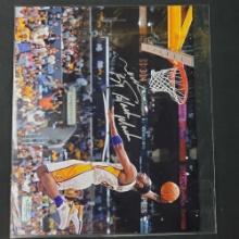 Kobe Bryant signed photo authenticated by Heritage authentication