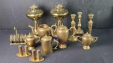 Box of approx.16 pieces heavy brass pieces letter holder teapots urns oil lamps candle holders more
