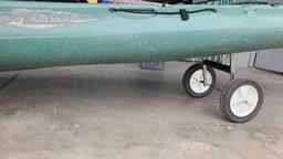 Hobie Mirage Adventure Fish Cannoe with gear and wheels stand