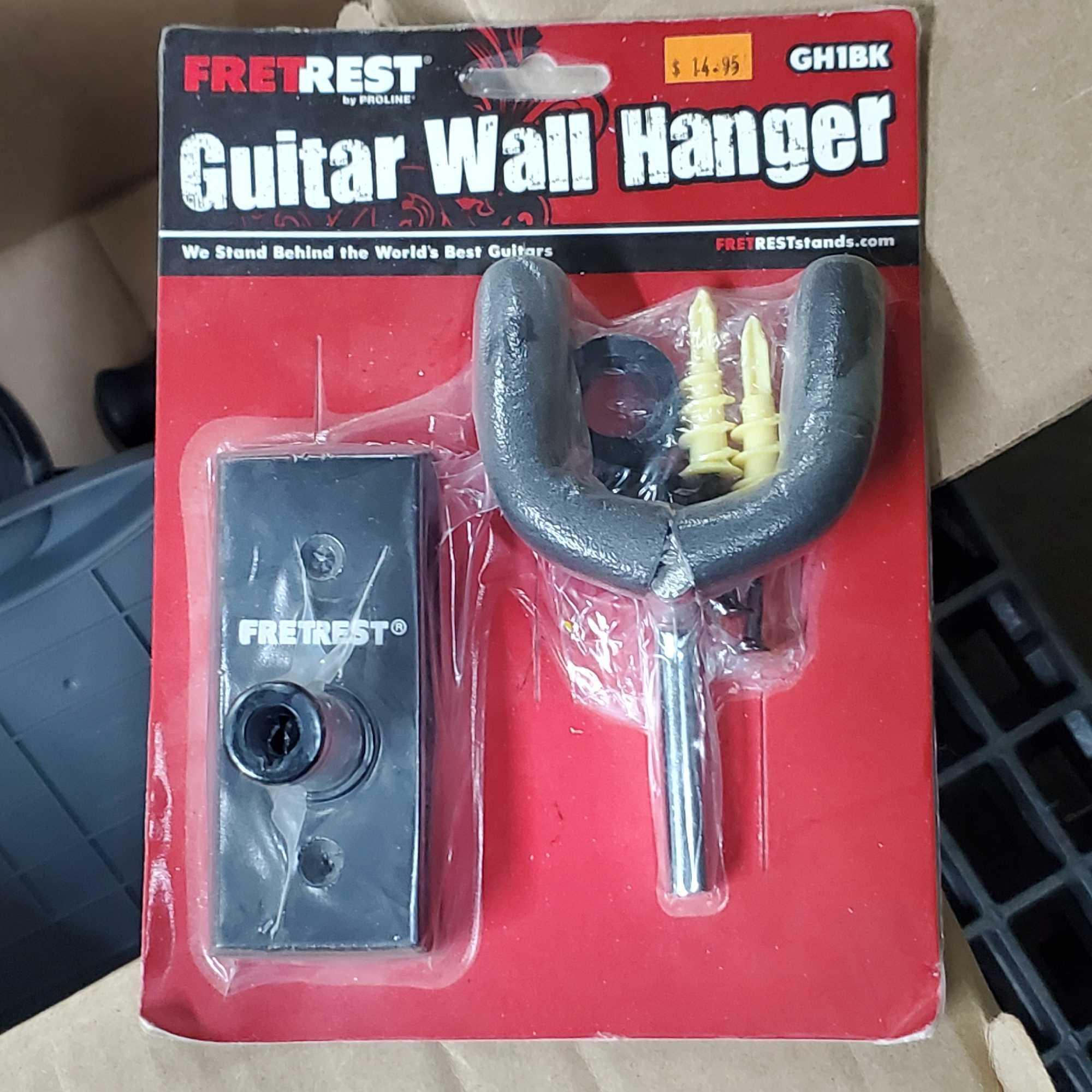 Box misc. Guitar wall hanger Stinger drill bots shooting targets Sharper Image CA825Q