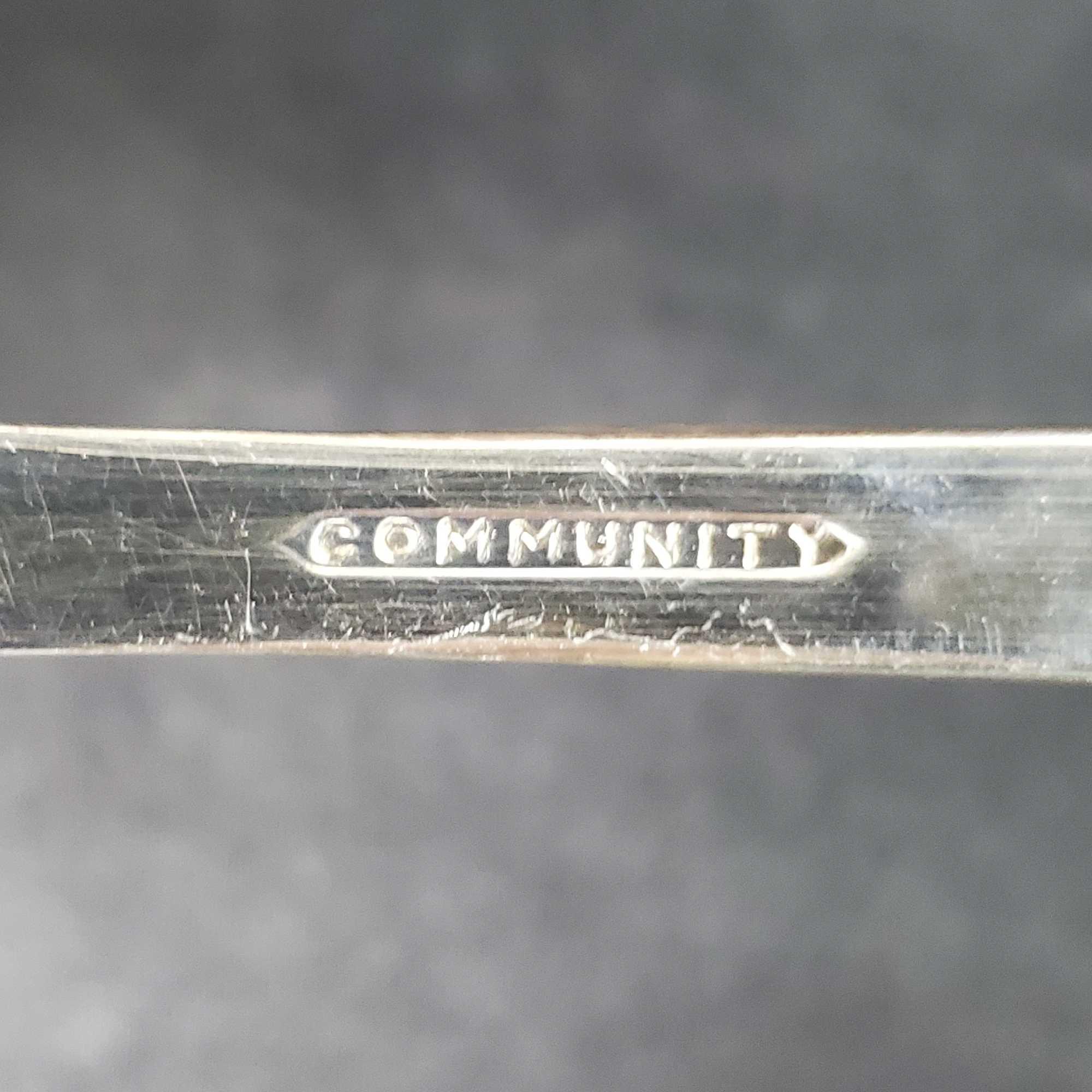 wooden silverware case with Community Silverplate flatware