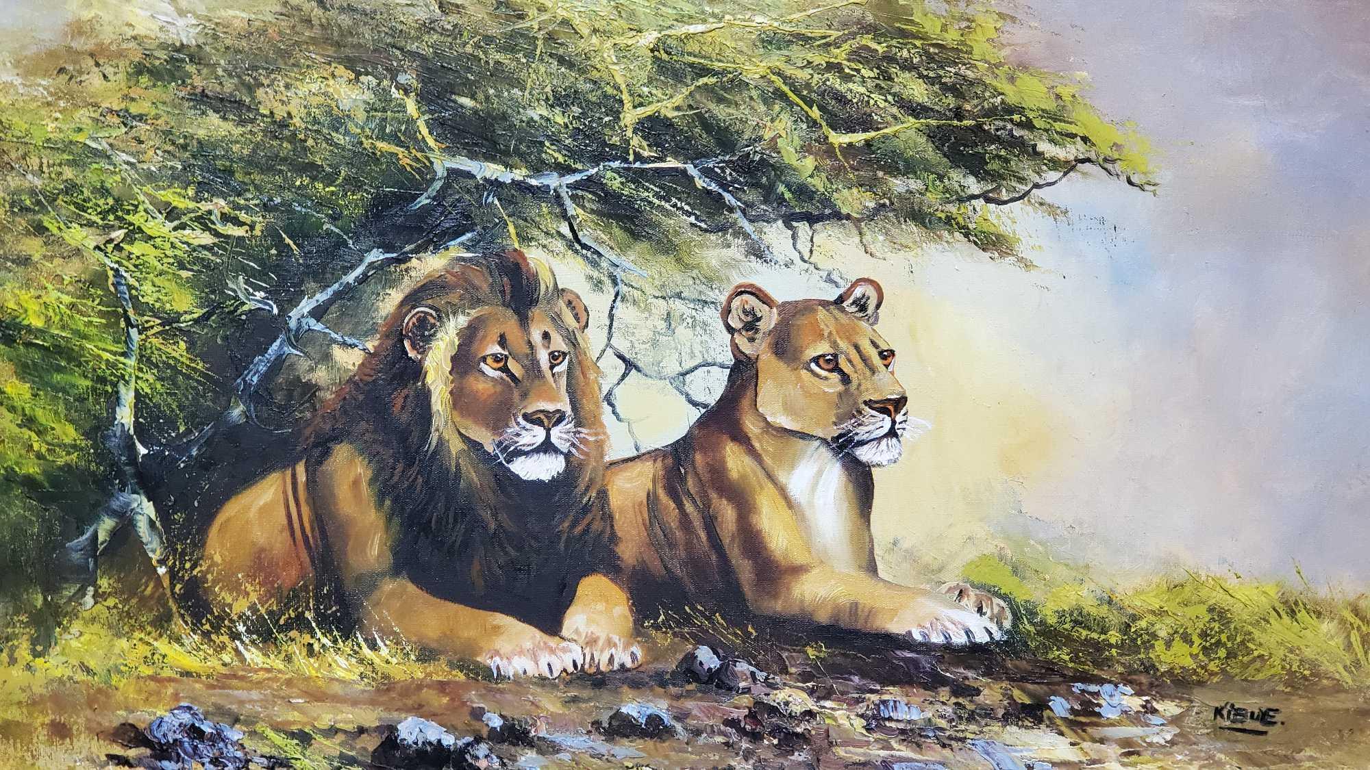 Framed oil/canvas artwork lion/lioness under bush signed Kibue