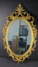 Large vintage SYROCO oval gold framed wall mirror