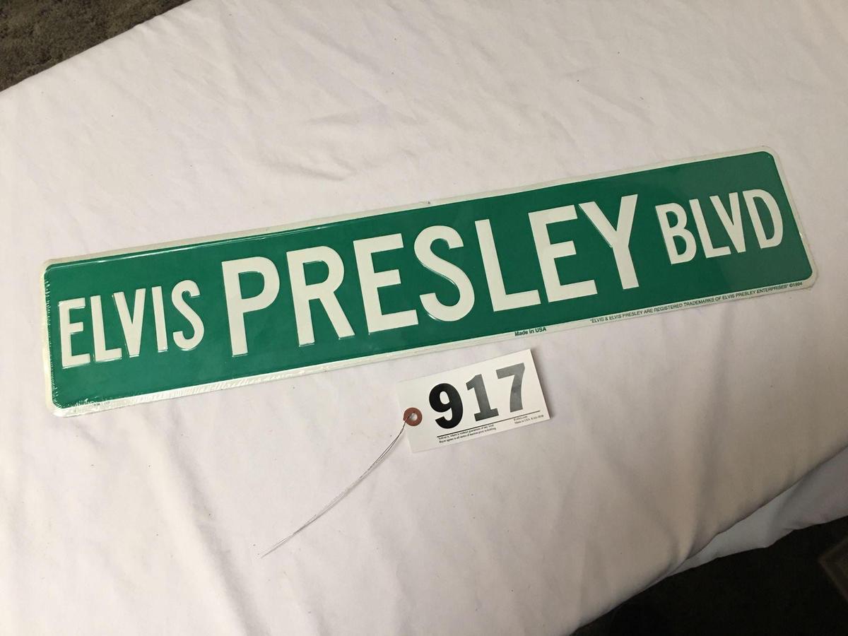 Elvis Presley tin Elvis Presley Blvd. sign