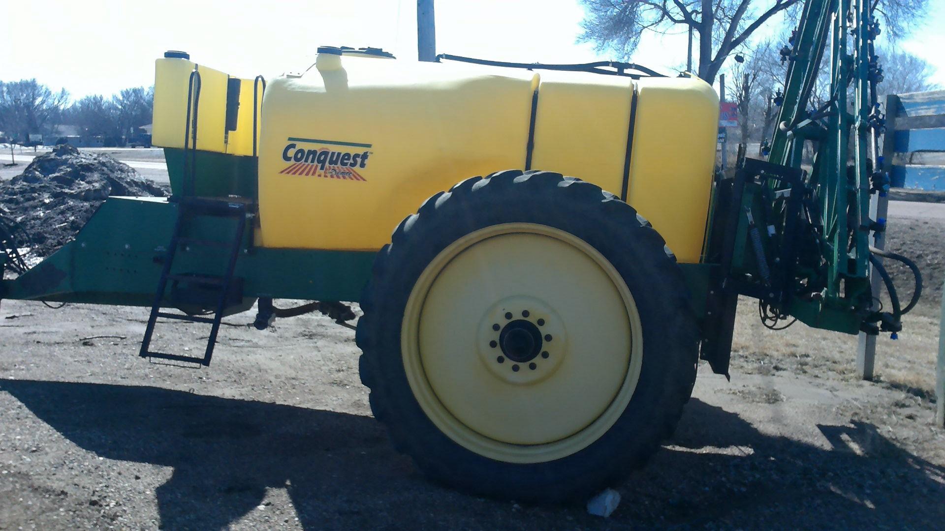 Demco Conquest pull type sprayer.