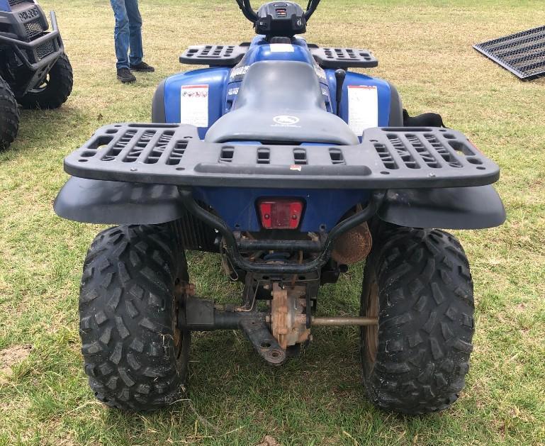 Blue 4 Wheeler - 2000 Polaris Magnum 325 2 Wheel Drive. Been sitting a couple years. Needs minor