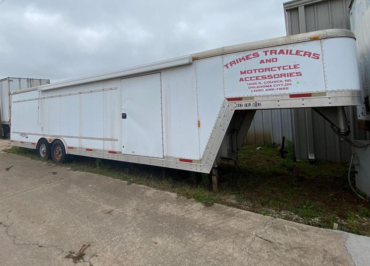 Gooseneck trailer Exis Aluminum with Awning Torsion Axles... approximately 40 ft on the floor. Total