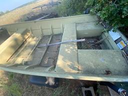 14 foot flat bottom boat and trailer. Has title....