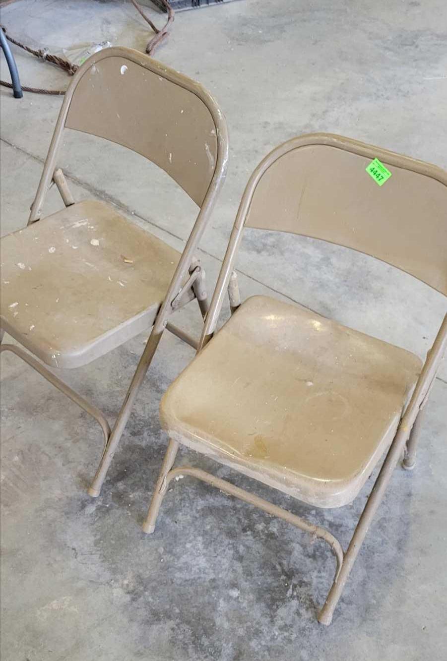 2 metal folding chairs