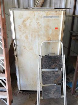 old fridgidaire and step ladder