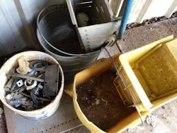 mop buckets and 5 gal bucket of metal pieces