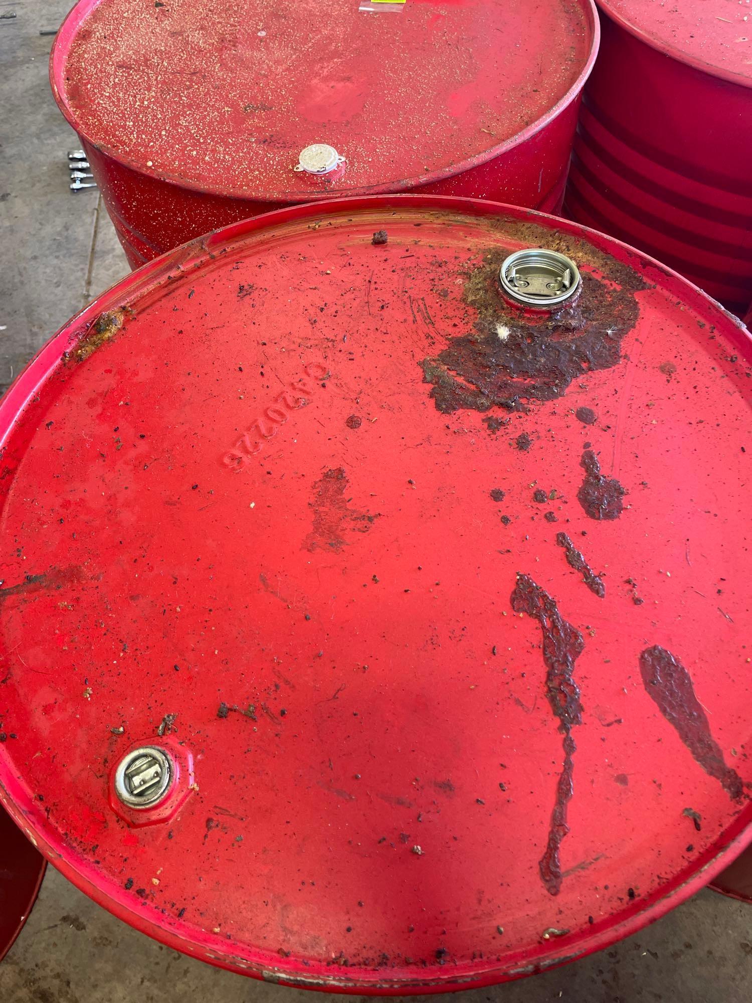 6 55 gallon metal drums