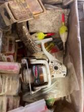 fishing plastic worms, small tackle box and reel