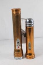 Two vintage metal flashlights made by Winchester