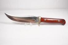 Buck Creek single blade skinner with 5.5 inch blade. Wood scales, leather sheath. Appears as new,