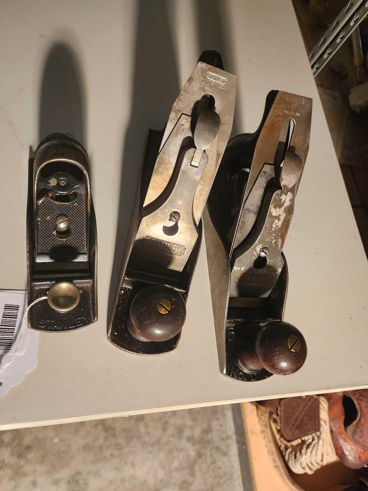 Three hand wood planes. Two Stanley 9" and one small 6". Used.