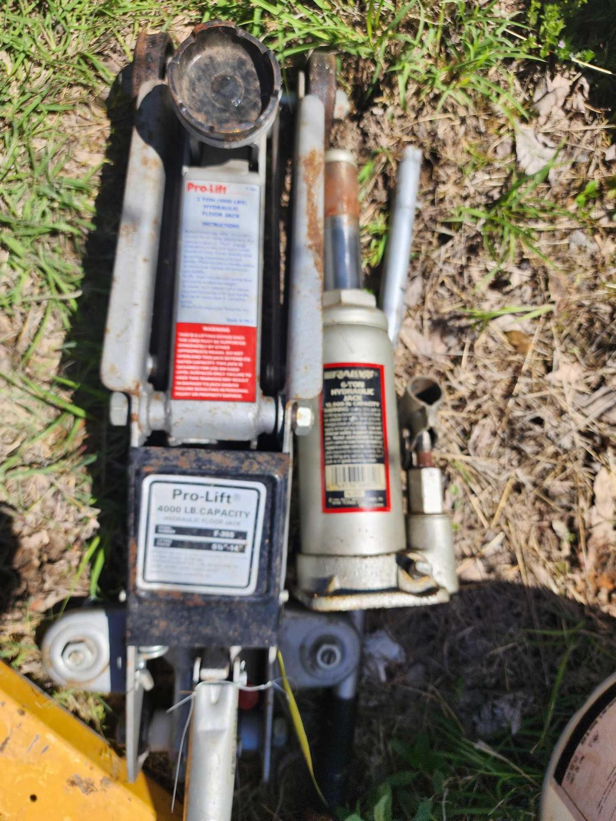 Two hydraulic jacks. one bottle jack and one floor. Used.