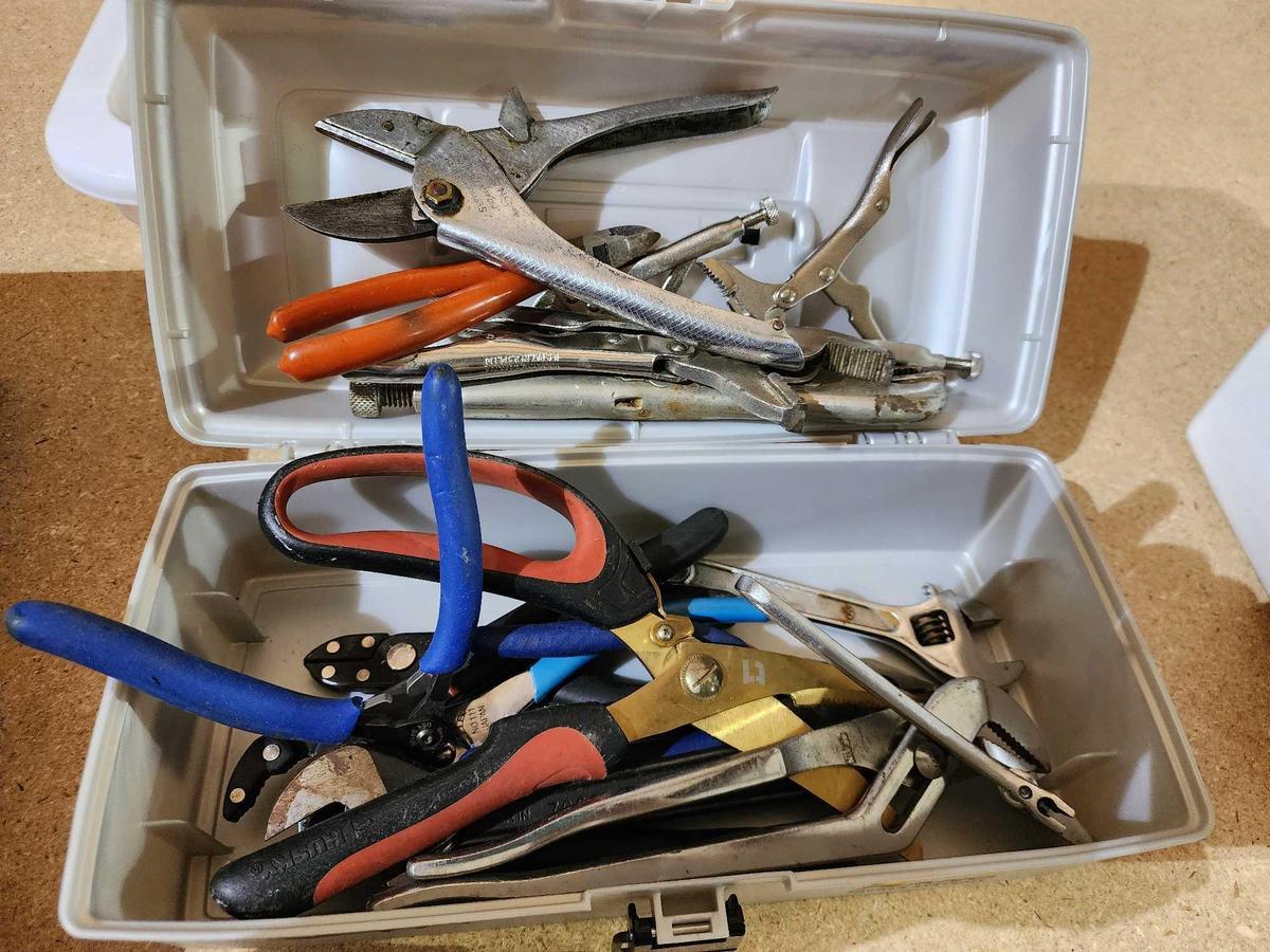 Plano tackle box with assorted pliers and wrenches. Used.