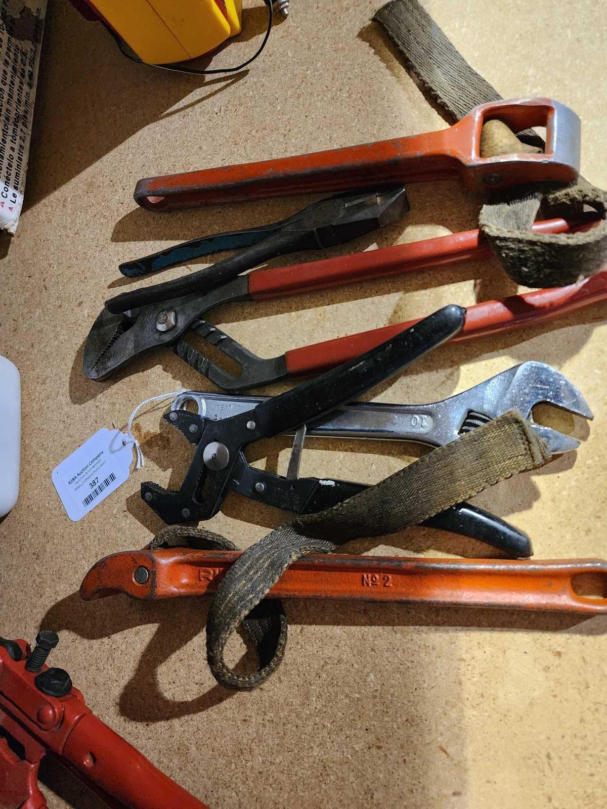 Six wrenches and one plier. Used.