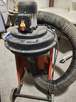 Electric saw dust catcher on wheeled cart with bag. Used.