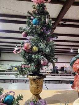 Two small front door Christmas trees in decorative pot stands. Used.