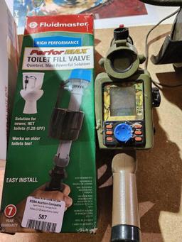 Fluidmaster toilet fill valve. New in box and a electronic hunting game, used.