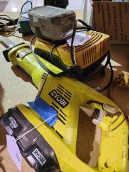 RYOBI battery reciprocating saw with charger and two batteries. Used.