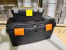 Two black plastic tool boxes. One large Black & Decker and, one small unknown. Both look unused.