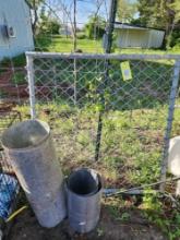 4' x 4' chain link gate and two rolls of aluminum flashing. One 14" and one 30".