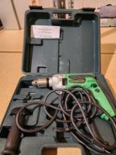 Hitachi heavy duty 1/2" electric drill in plastic case. Used in very good condition.