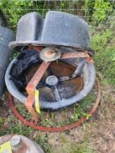 two plastic troughs, one with metal stand