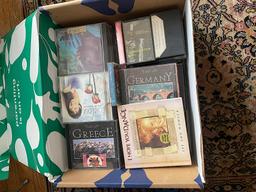 CD RACK WITH 2 BOXES OF CD'S AND CASETTS