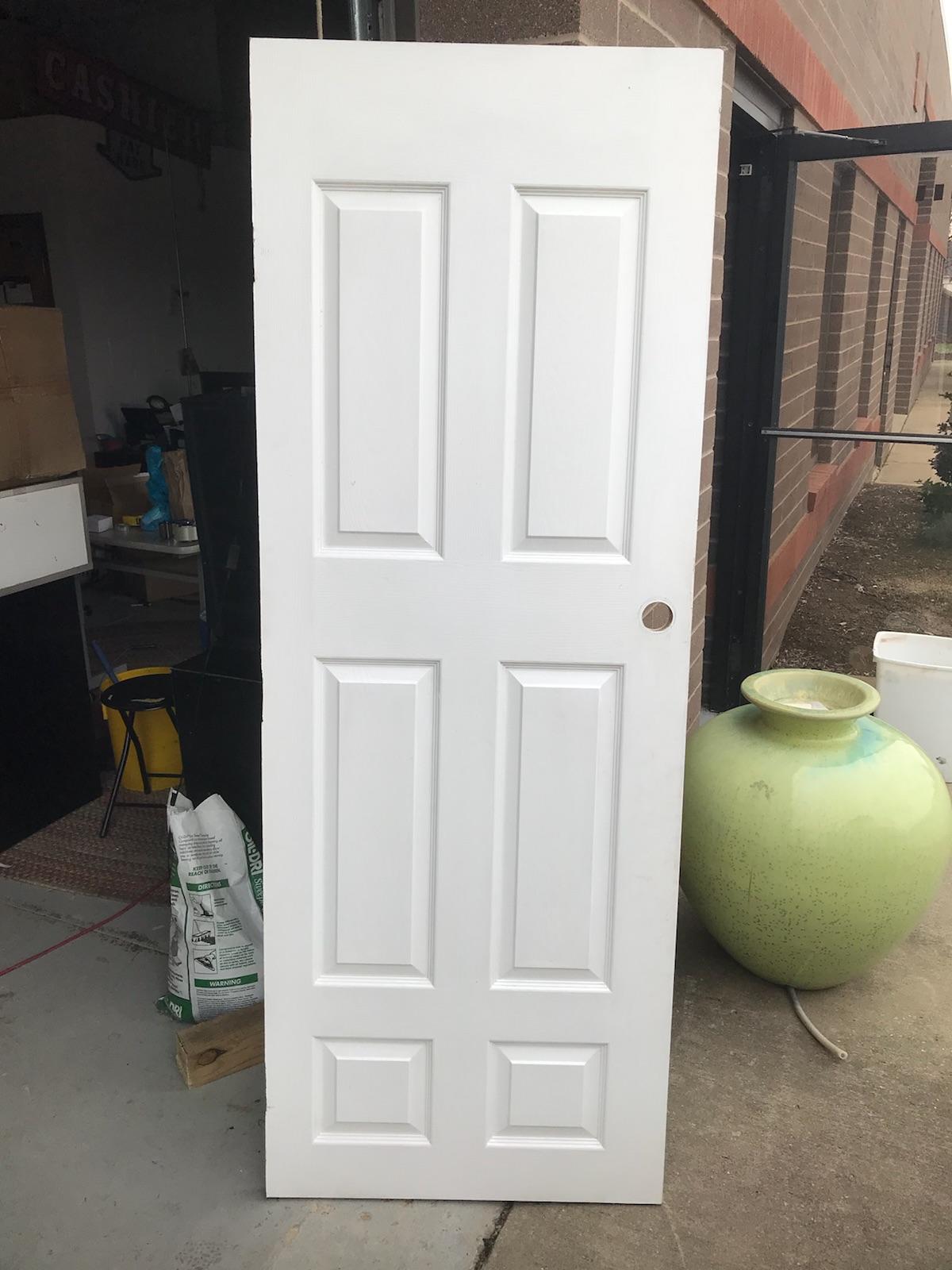 WHITE WOODEN DOOR