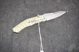 Browning folding knife with chip finish OD Green handle