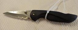 Buck Custom Folding Knife with Part serrated blade 5 7/8 in long