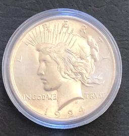 1924 Silver Peace Dollar estimated up to $900 *pretty*