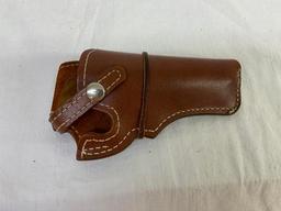 Leather holster for a revolver, 44" leather ammo belt and a