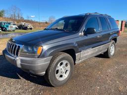 1999 Jeep Grand Cherokee 4x4 (MPV), VIN # 1J4GW58N9XC716473