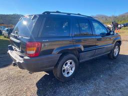 1999 Jeep Grand Cherokee 4x4 (MPV), VIN # 1J4GW58N9XC716473