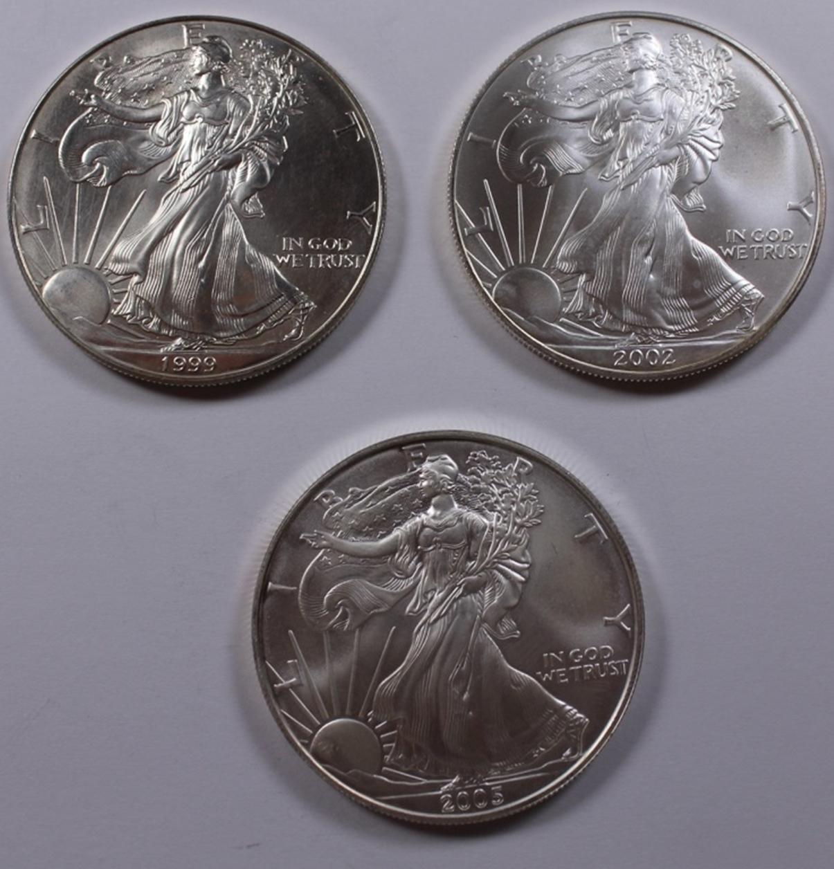 THREE AMERICAN SILVER EAGLES